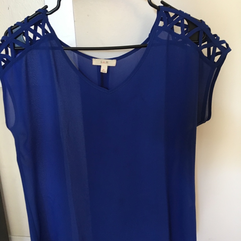 E2M blue blouse- shoulder details and cut outs